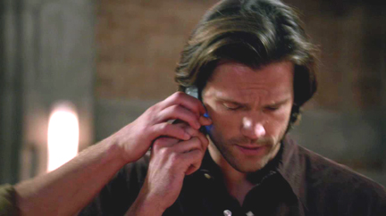 Dean grabs the phone away from Sam... Dean grabs the phone away from Sam...